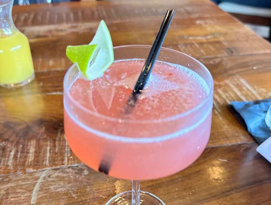 pink drink in a martini glass
